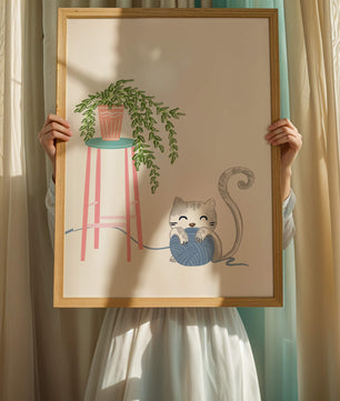 Cat Playing with Yarn Beside a Potted Plant on Pink Stool - Mi tienda
