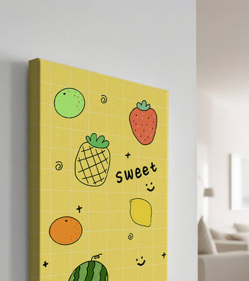 Playful fruit pattern on yellow grid background