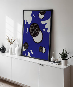 Graphic design featuring cookies and milk splashes on blue background