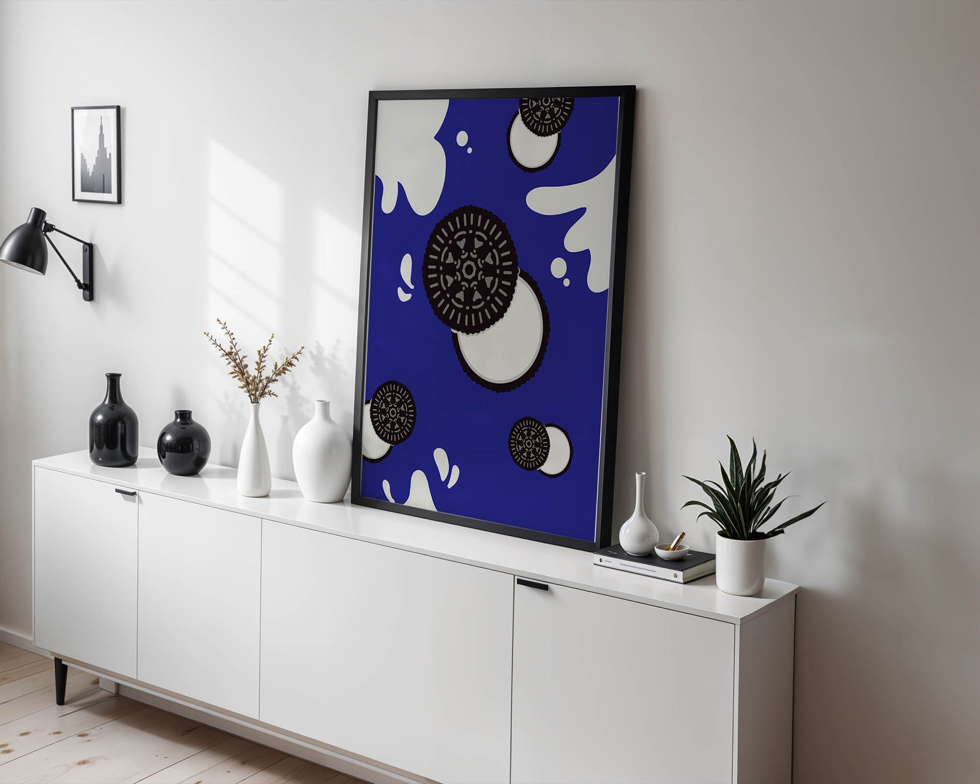 Graphic design featuring cookies and milk splashes on blue background