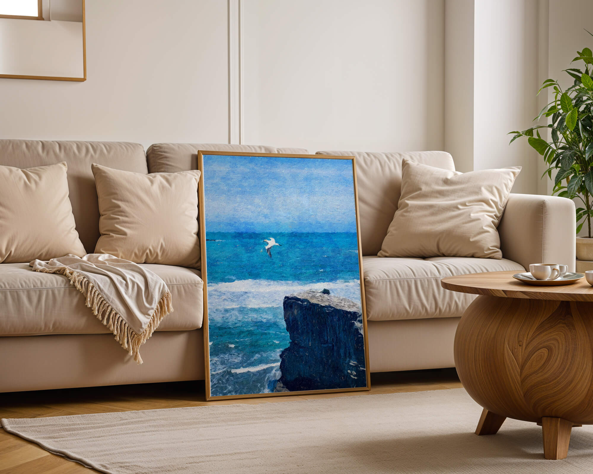 Seascape with soaring seagull over rocky cliff and ocean waves