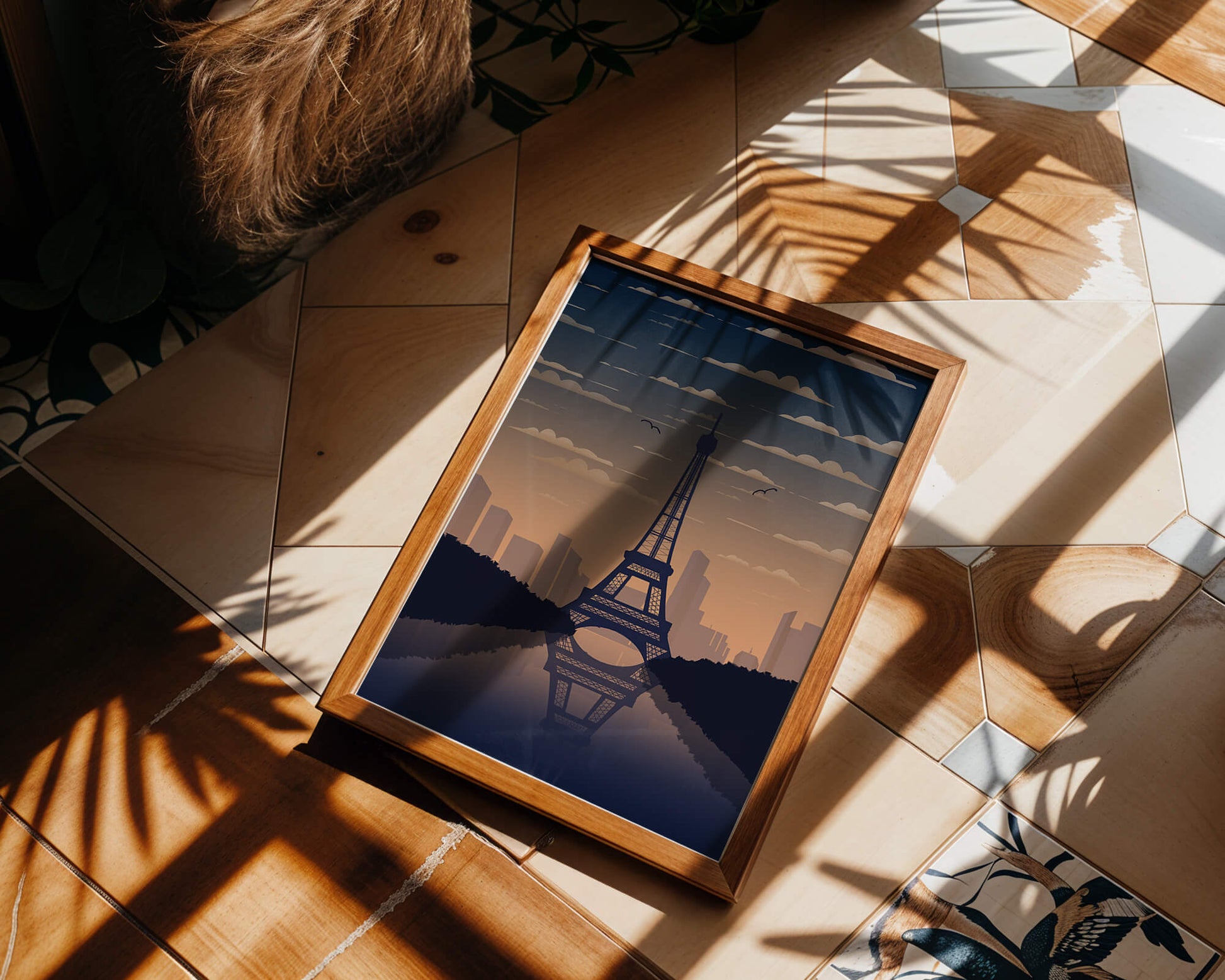 Scenic view of the Eiffel Tower at dusk with city skyline reflection