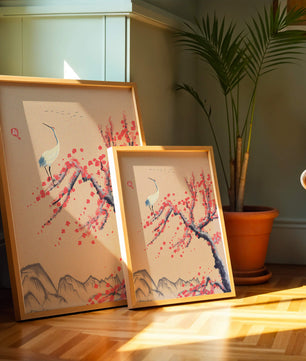 Elegant crane on cherry blossom tree with mountainous background