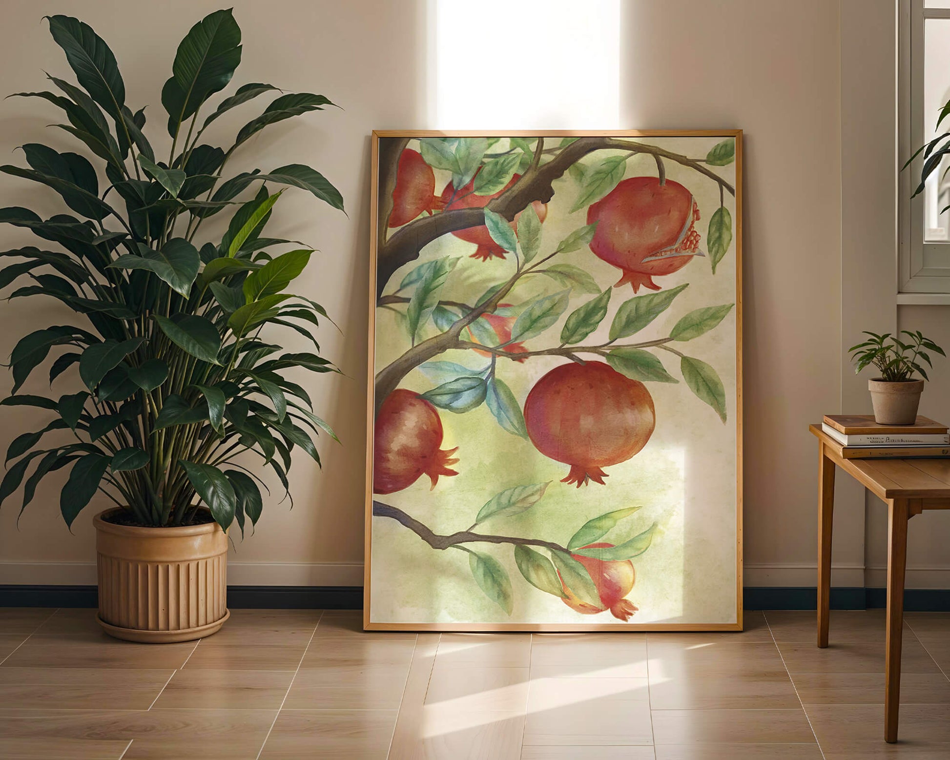 Watercolor illustration of pomegranates on a branch with leaves