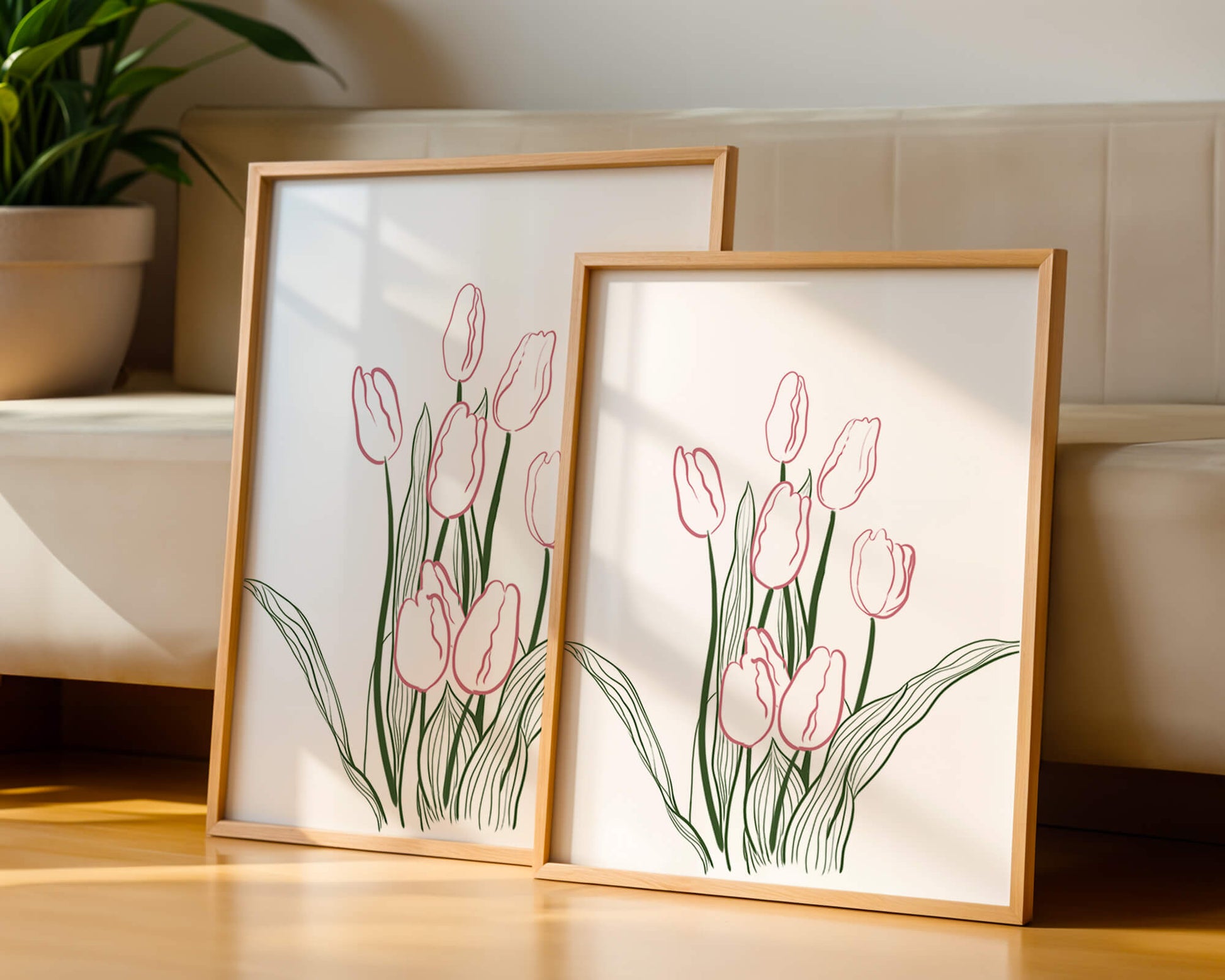 Wunderschöne rosa Tulpen mit grünen Blättern auf einer minimalistischen Leinwand