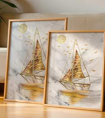 Elegant sailboat with gold elements against a textured sky