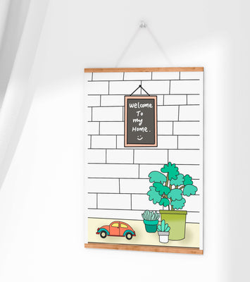 Chalkboard welcome sign with potted plants and a toy car