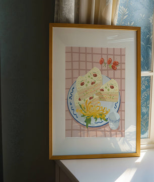 Illustration of layered cake on patterned plate with flowers and a cup