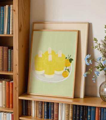 Illustration of yellow popsicles and oranges on a plate