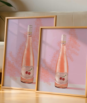 Illustrated wine bottle with a cherry label on pink background