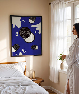 Graphic design featuring cookies and milk splashes on blue background