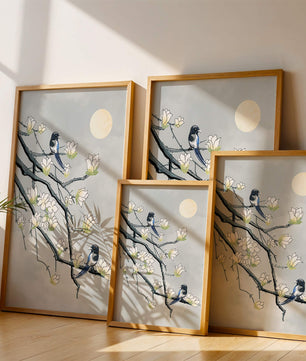 Birds on blossoming branches under a serene moonlit sky