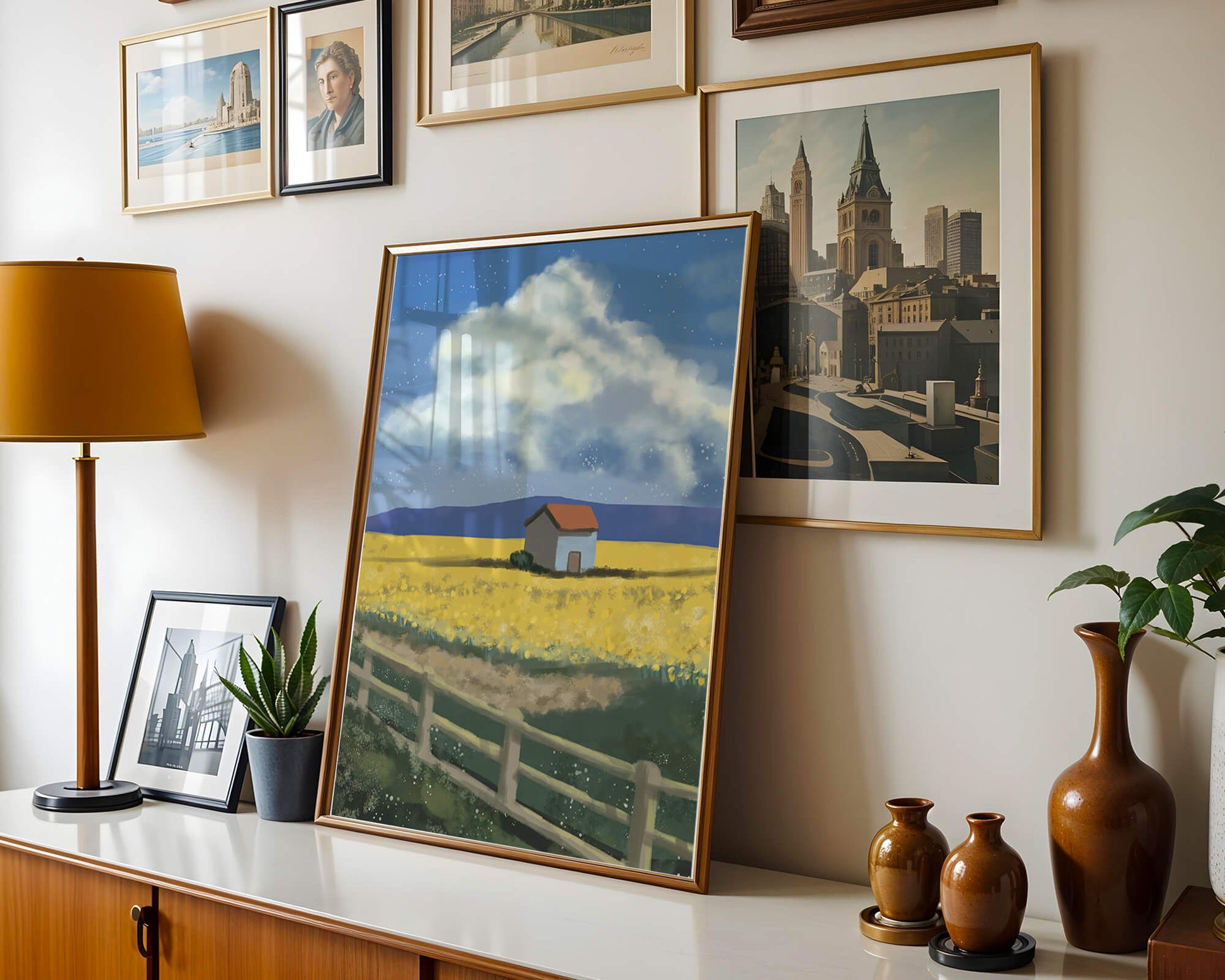 Idyllic rural scene with house and yellow field under blue sky