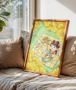 Charming autumn picnic scene with girl and cat surrounded by ginkgo leaves