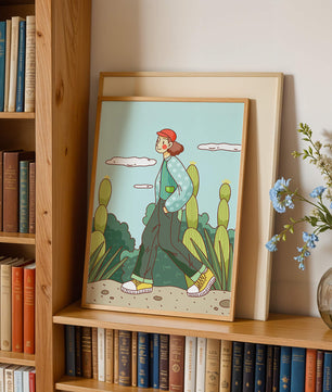 Person walking in desert landscape with cacti