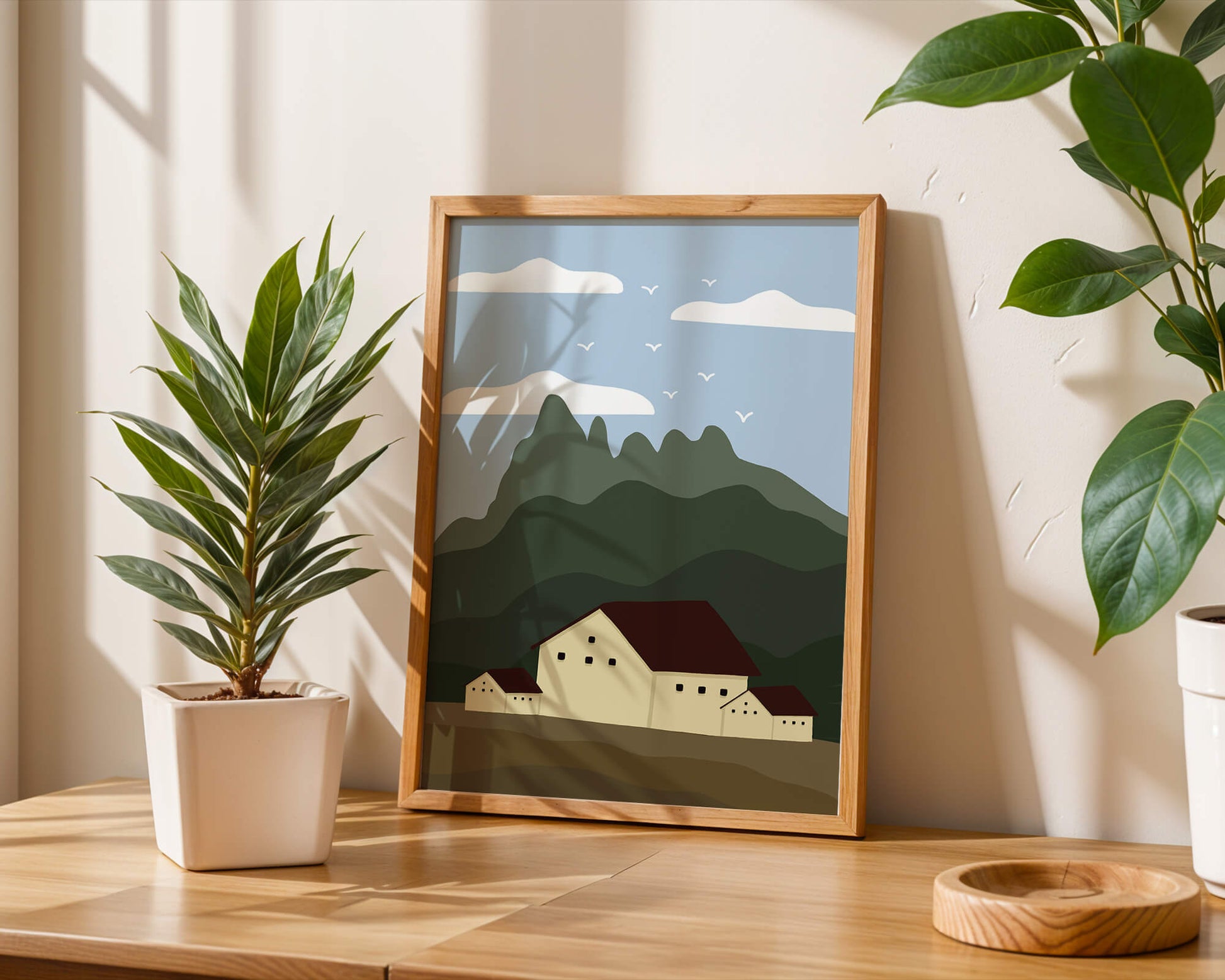 Paisaje minimalista de montaña con casas y pájaros en el cielo