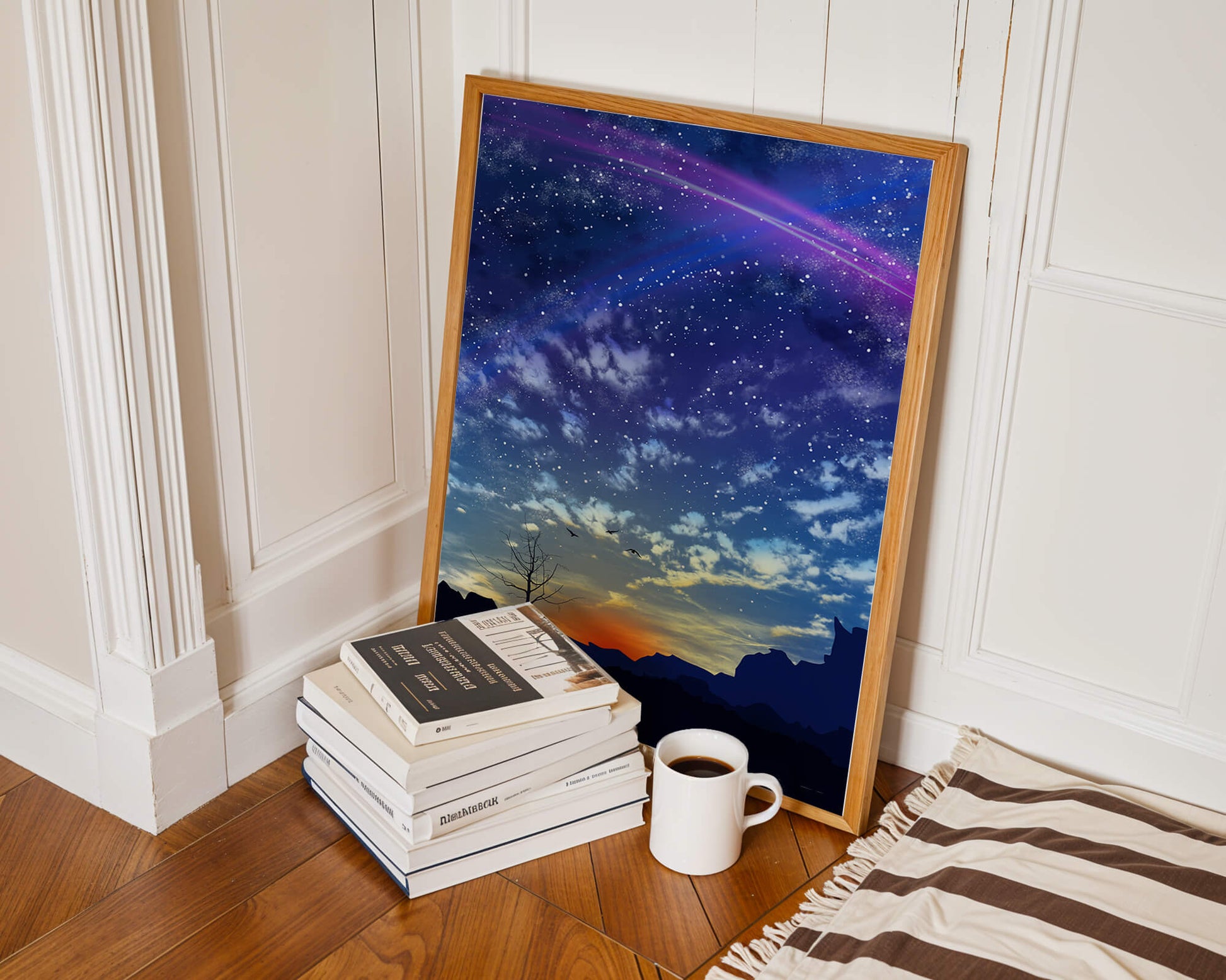 Starlit night sky with colorful sunset and silhouetted landscape