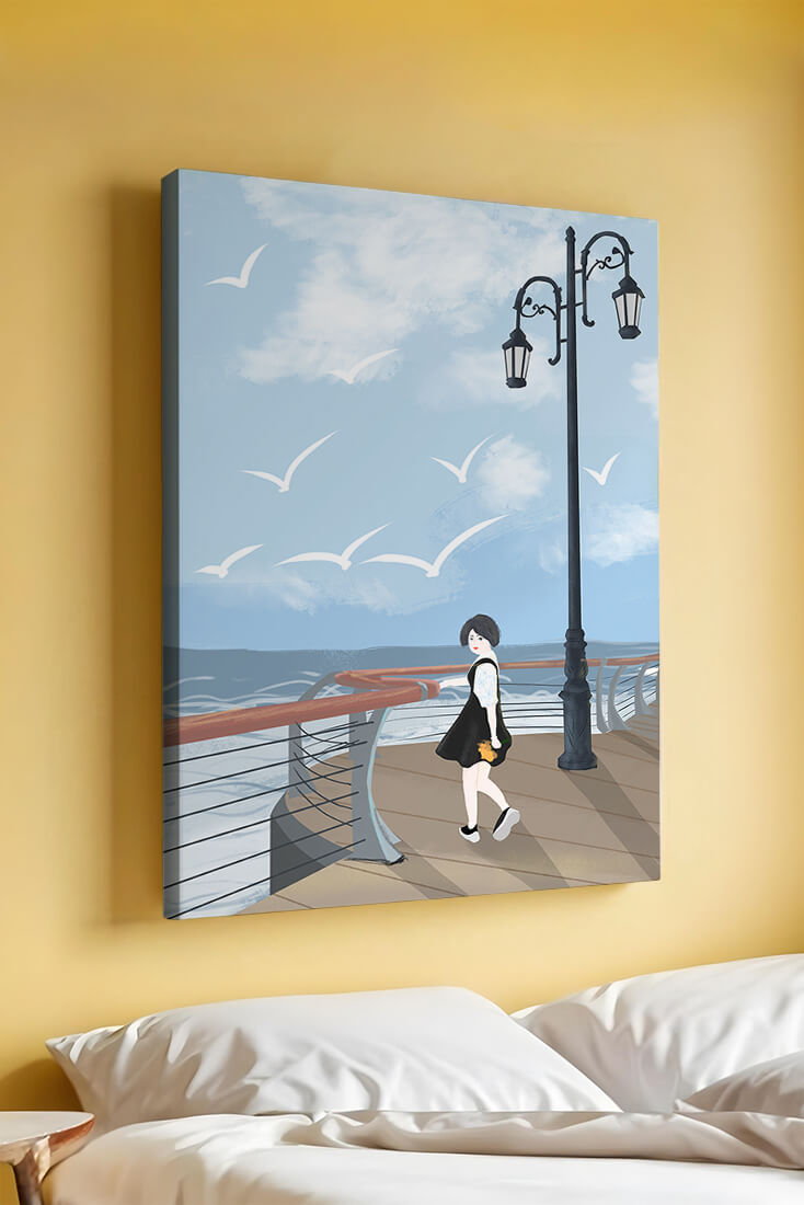 Seaside boardwalk with woman walking under street lamps amid seagulls