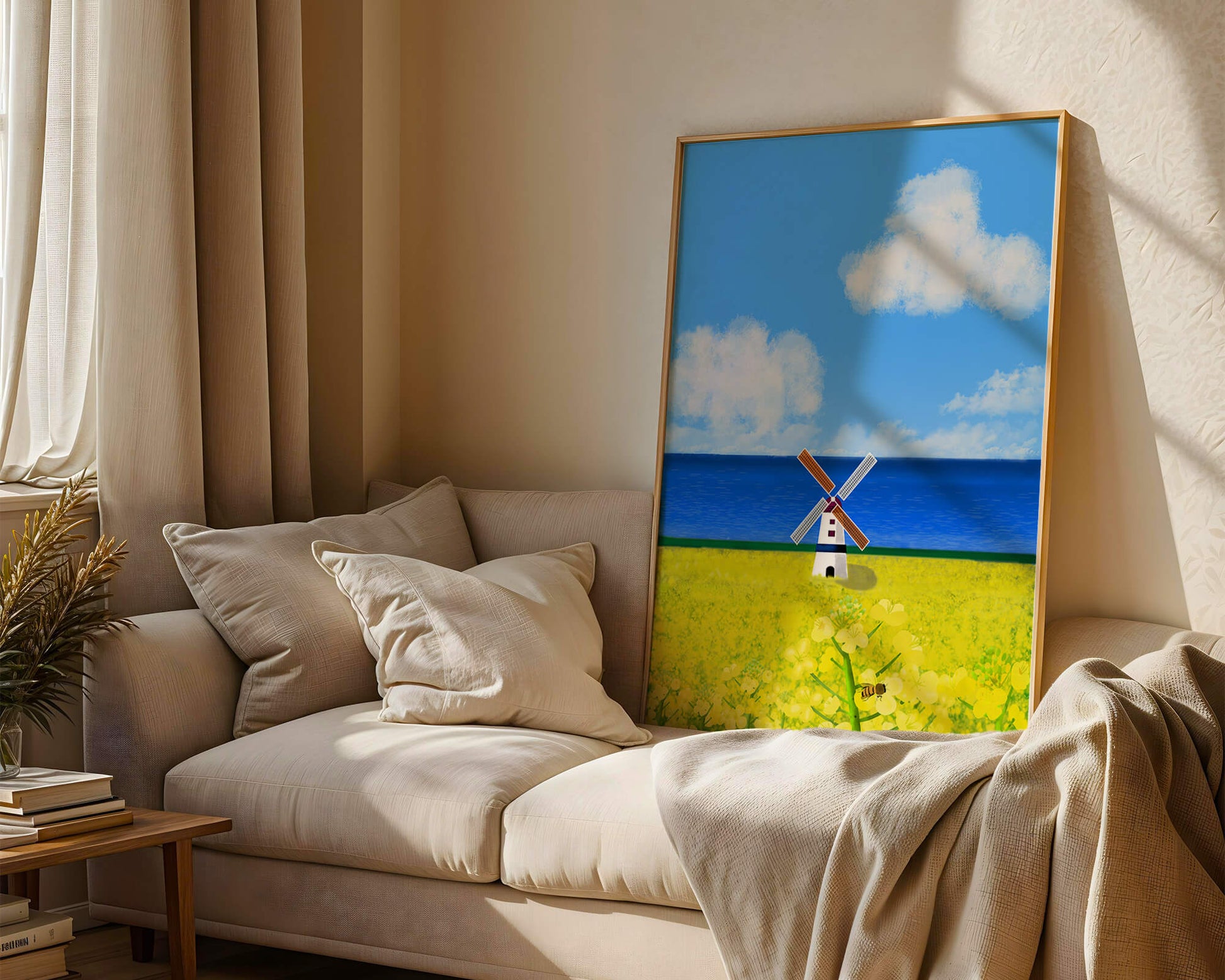 Scenic landscape with windmill in blooming field by the sea