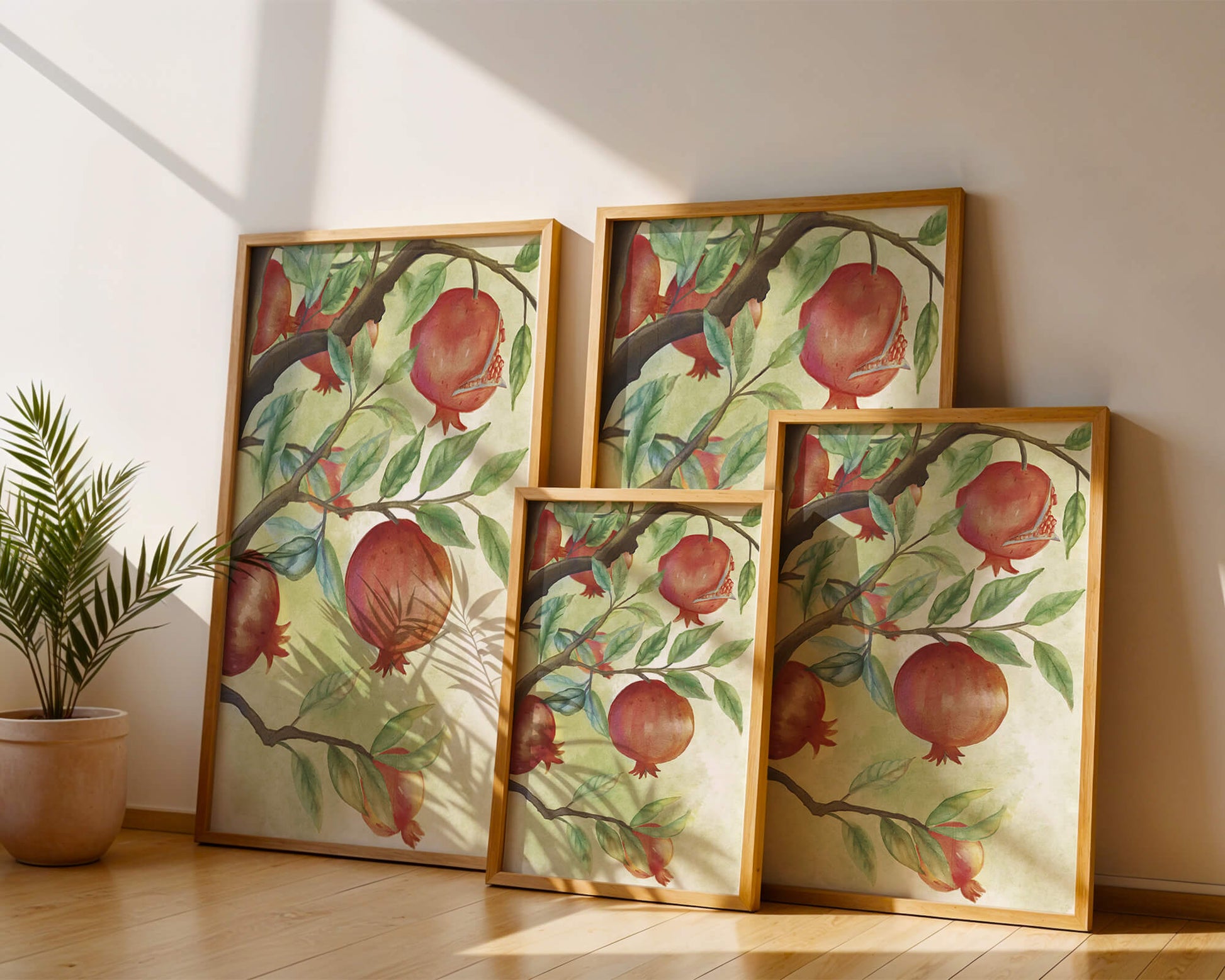 Watercolor illustration of pomegranates on a branch with leaves