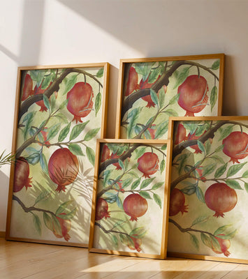 Watercolor illustration of pomegranates on a branch with leaves