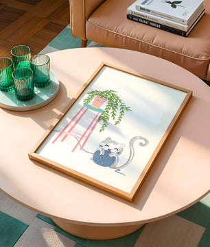 Cat Playing with Yarn Beside a Potted Plant on Pink Stool - Mi tienda