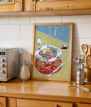 Colorful dumplings and tea set on decorative mat