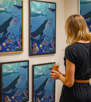 Underwater scene with whales, fish, and coral reef