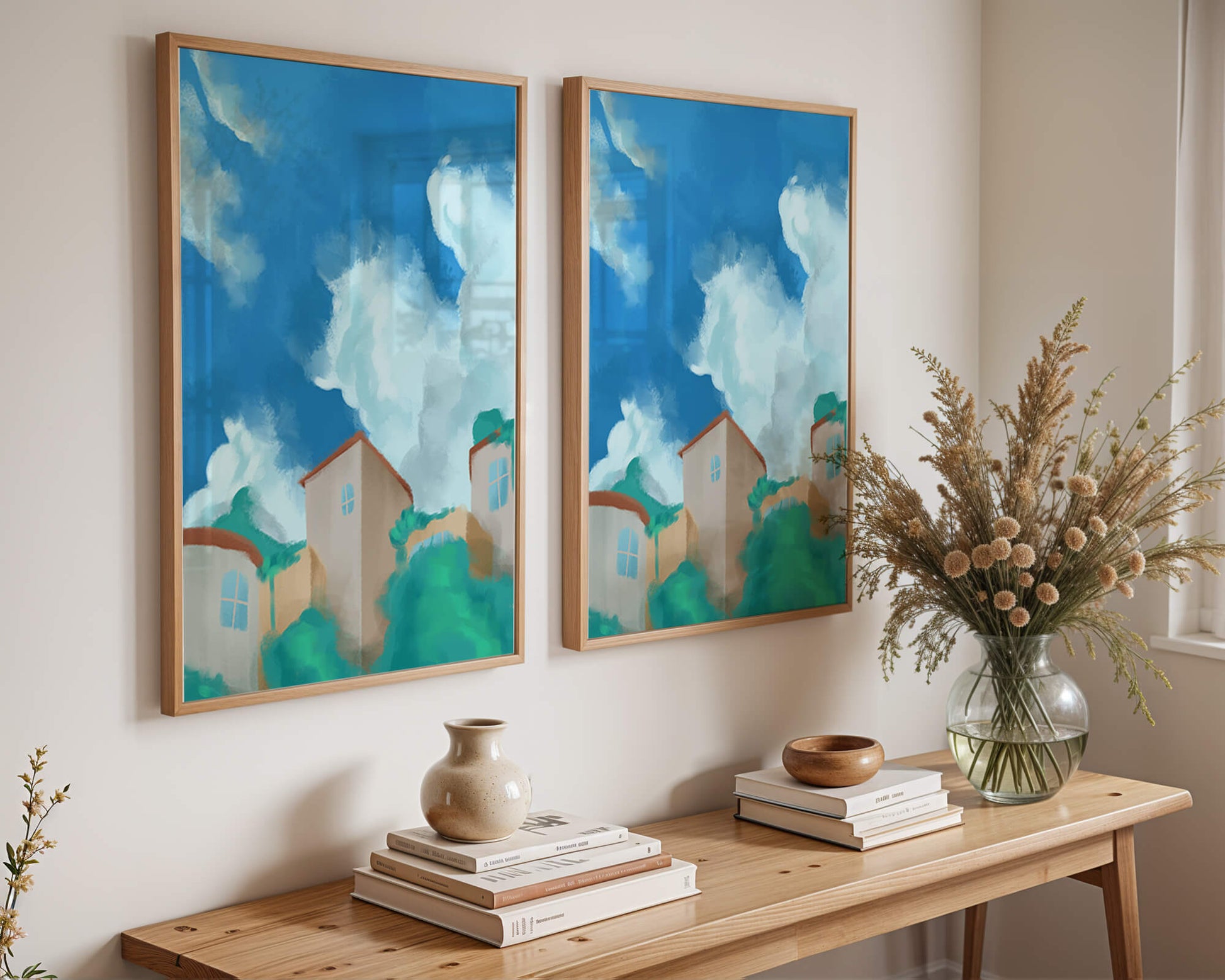 Serene landscape with houses and fluffy clouds against a blue sky
