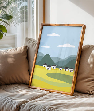 Pastoral Landscape with Mountains and Houses Under Blue Sky