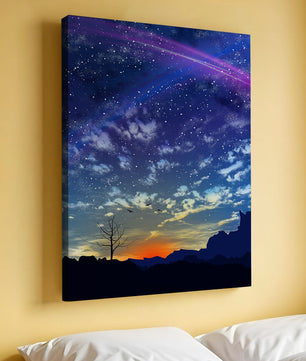 Starlit night sky with colorful sunset and silhouetted landscape