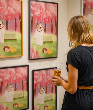 Whimsical scene with giant cat and girl under cherry blossoms
