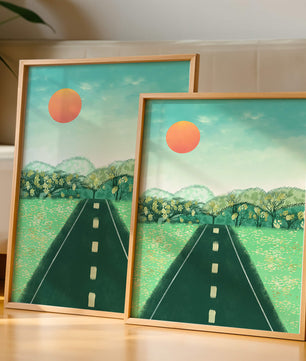 Serene Landscape with Road Leading to Sunset and Lush Greenery