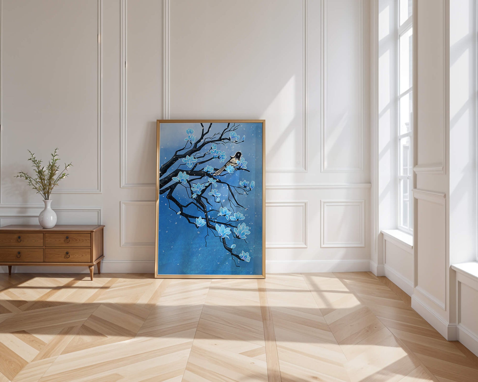 Bird on a branch with blue flowers against a snowy background