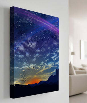 Starlit night sky with colorful sunset and silhouetted landscape