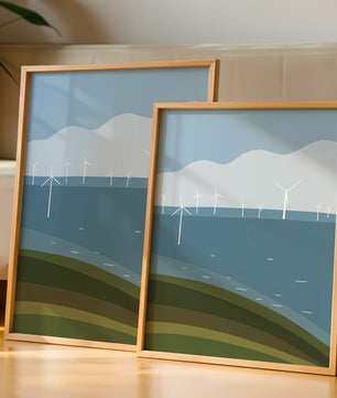 Wind Turbines on Rolling Hills Against a Clear Blue Sky