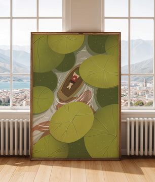 Person in boat among lush green lily pads