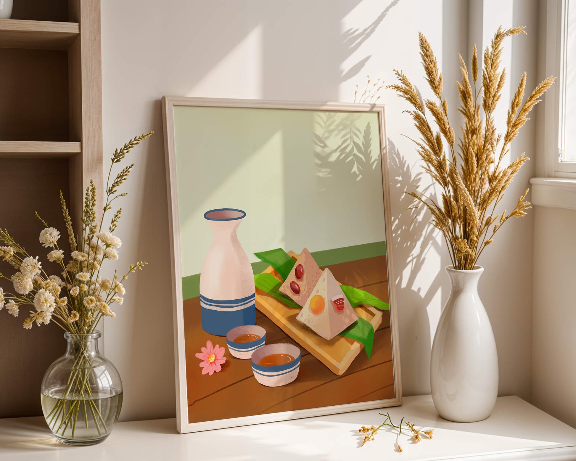 Traditional Asian rice dumplings with tea set on bamboo tray