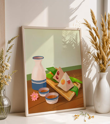Traditional Asian rice dumplings with tea set on bamboo tray