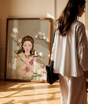 Femme élégante avec des outils de maquillage parmi des branches de magnolia en fleurs