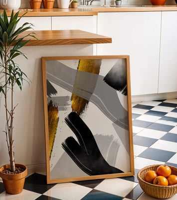 Abstract art piece with gold and black brushstrokes on a gray background