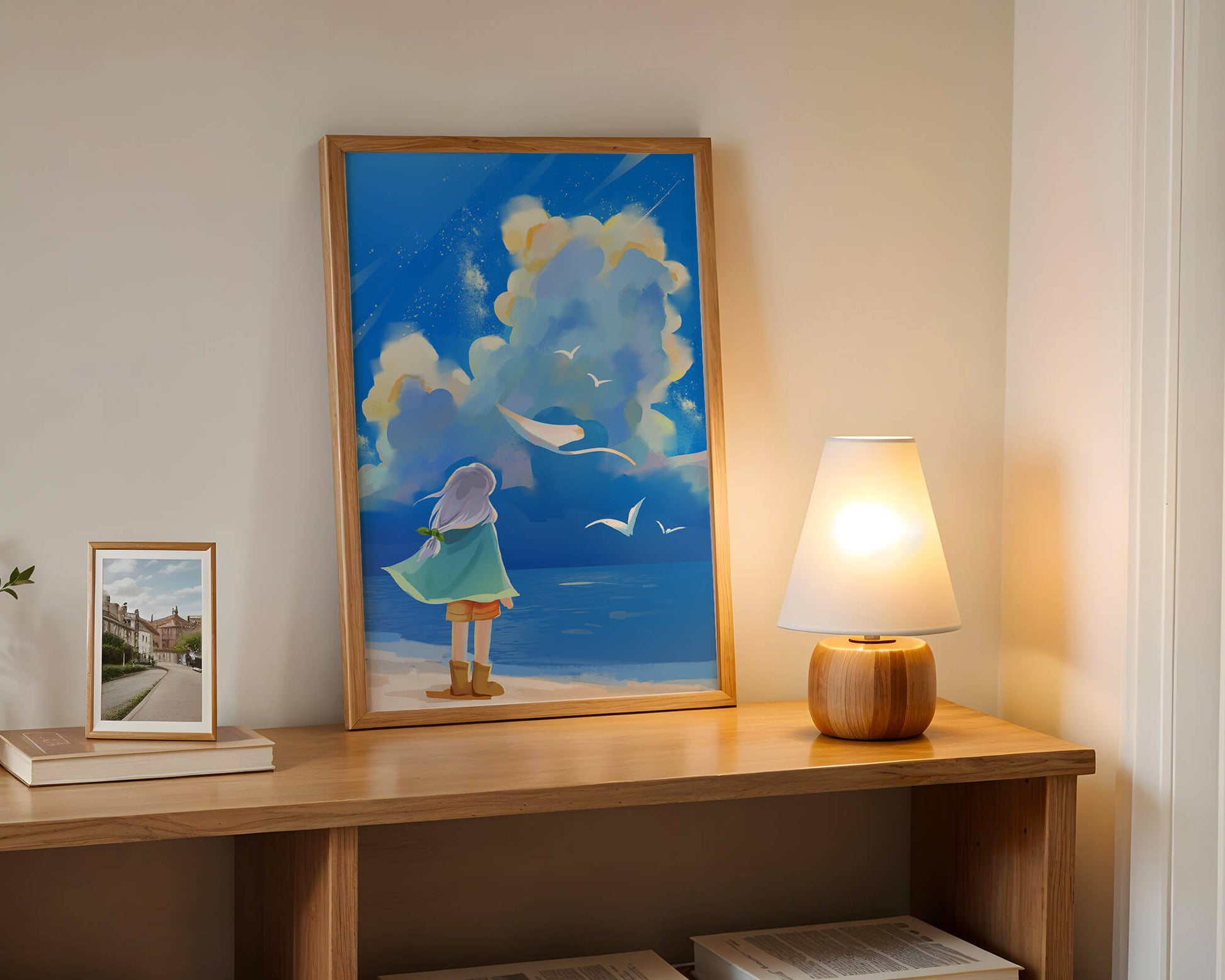 Young person gazing at a vibrant seaside sky with birds flying