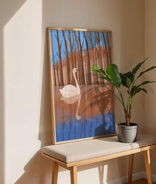 Serene swan on calm water with reflections of trees