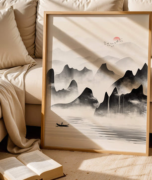 Peaceful mountain landscape with mist and rising sun