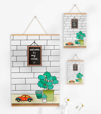 Chalkboard welcome sign with potted plants and a toy car