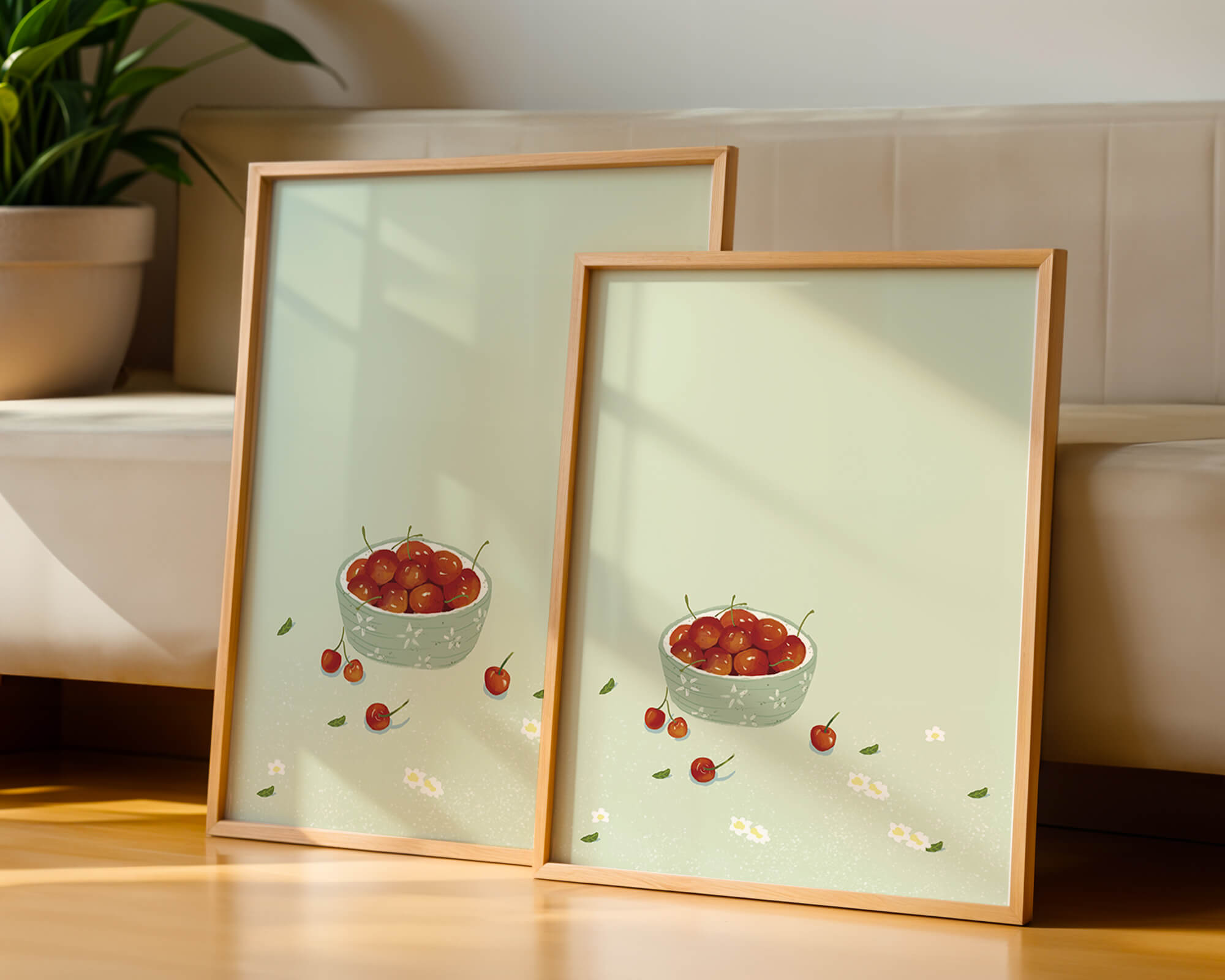 Cherries in a decorative bowl with floral accents on a soft green background