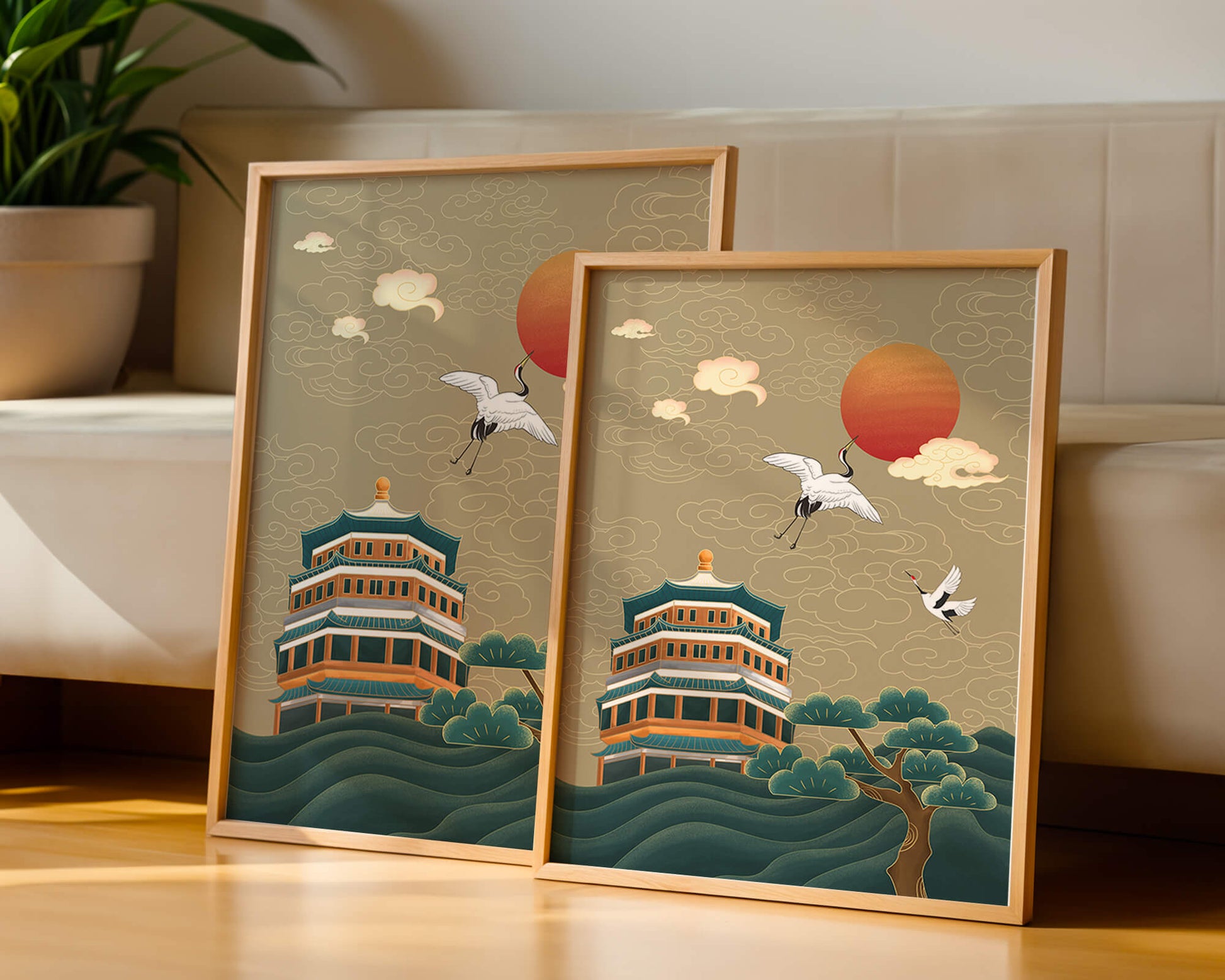 Obra de arte asiática tradicional con grullas y pagoda bajo un sol rojo