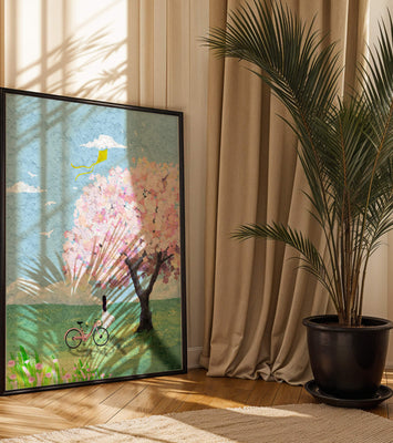 Springtime scene with cherry blossom and girl with bicycle