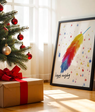 Colorful feather with inspirational message on abstract paint splatter background