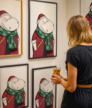 Festive hippo in a red outfit with a green snowflake scarf